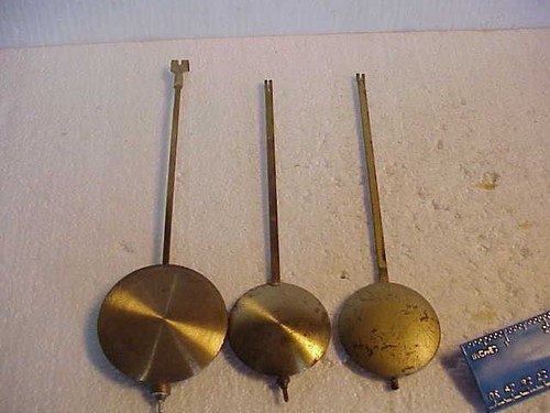 Used brass colored clock - colored,